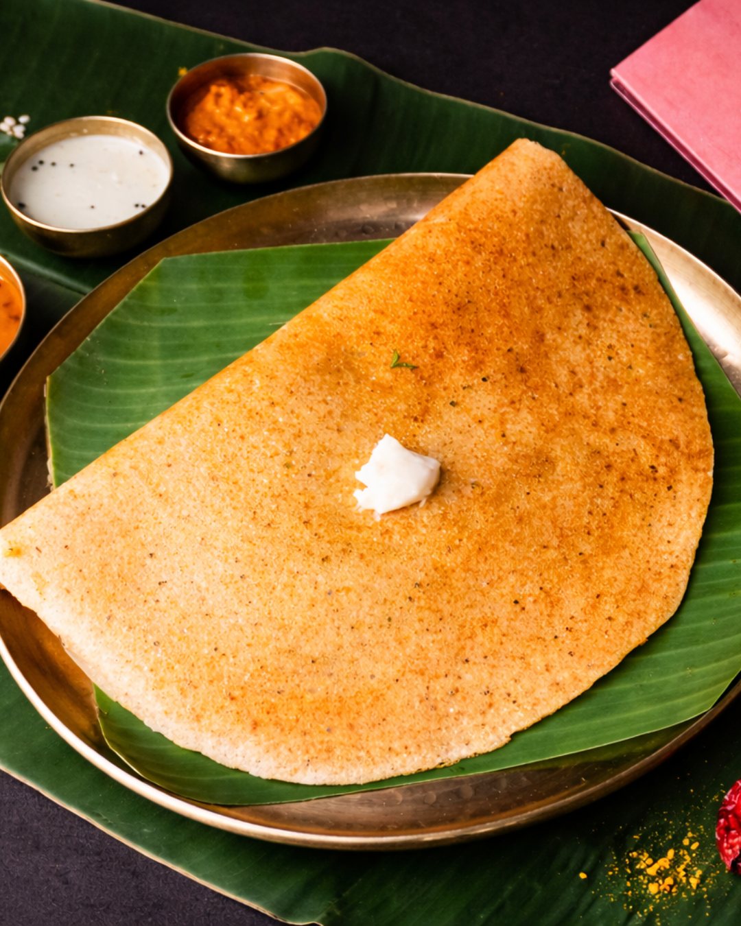 Benne masala dosa served on banana leaf with chutney and sambhar at Anantha, Mira Road