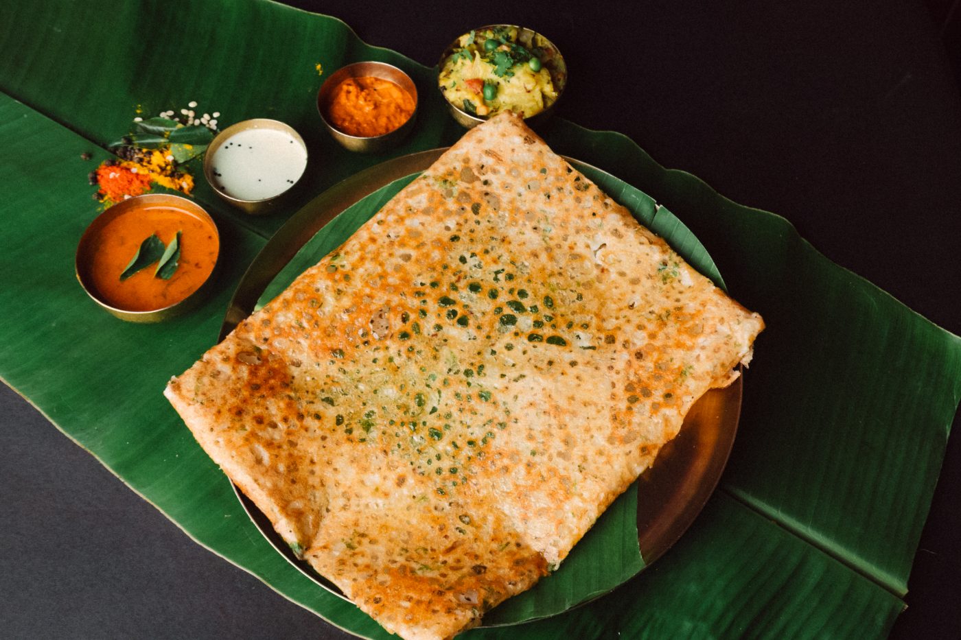 Rava masala dosa served on banana leaf at Anantha Veg World, Mira Road